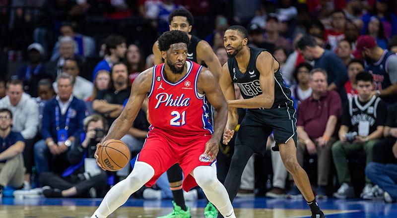 Kansas Üniversitesinde kolej basketbolu oynayan Embiid, burada bir sene geçirdikten sonra NBA draftına girme kararı aldı... Ne var ki Joel Embiid'in NBA kariyeri, yaşadığı ağır sakatlık nedeniyle iki yıl gecikmeli başladı. Gelecek vadeden oyuncular arasında gösterilen Embiid, 76ers tarafından 2014 yılında 1. Tur 3. sıradan draft edildi. Performansı merakla beklenen Embiid, sağ ayağındaki kırık nedeniyle iki kez ameliyat geçirmek zorunda kaldı ve NBA sahnesine 2016-2017 sezonunda çıkabildi.